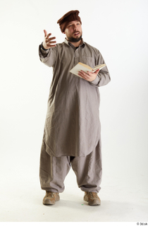 Luis Donovan Afgan Civil Pose with Book standing talking whole…